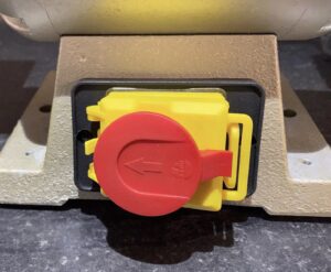 Bench grinder with sanding band attachments