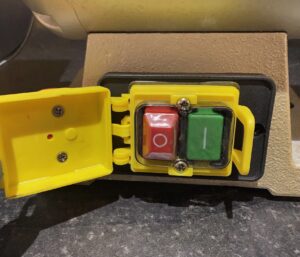 Bench grinder with sanding band attachments